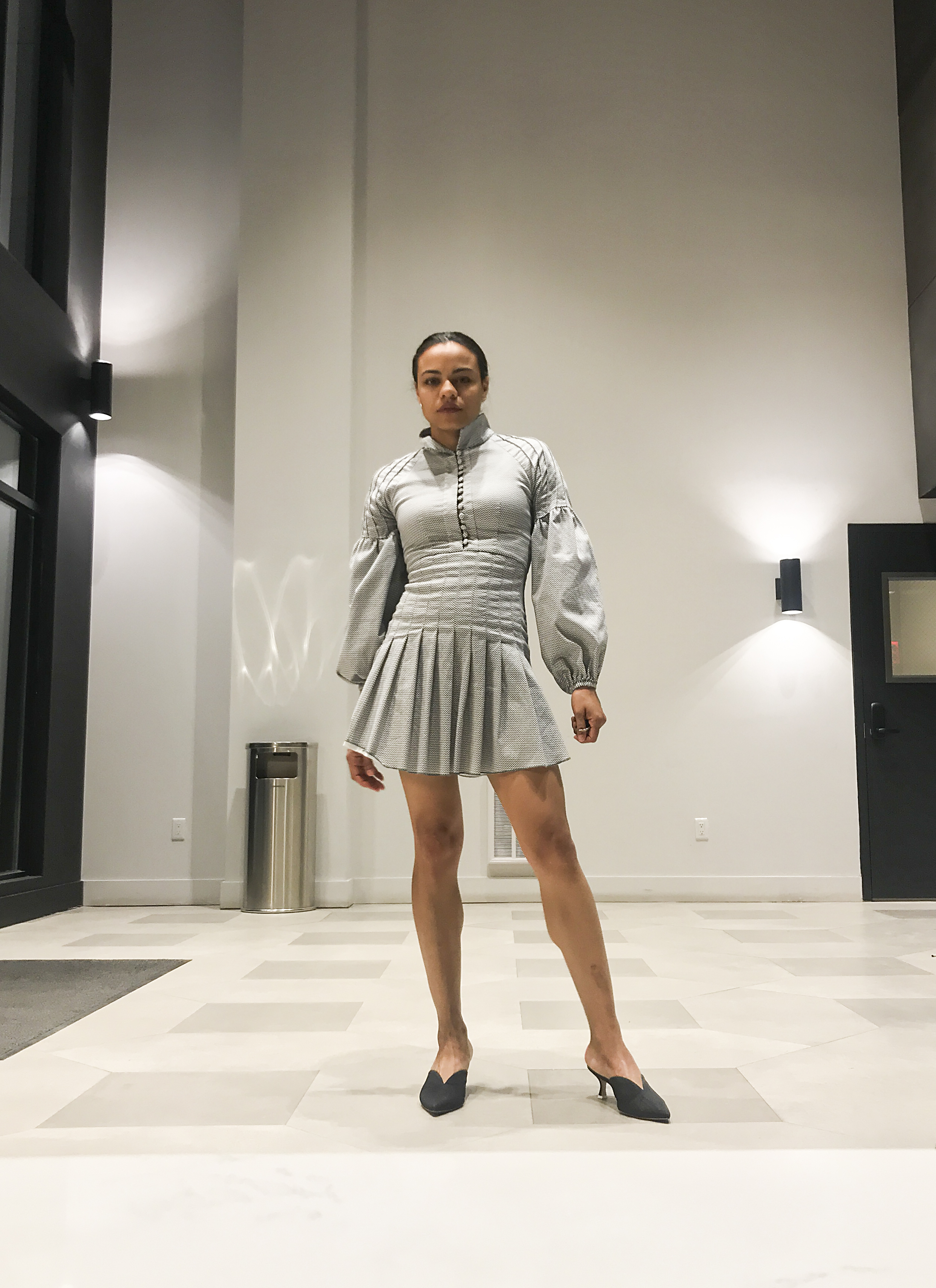 Dress: C/MEO Collective. Shoes: Attico